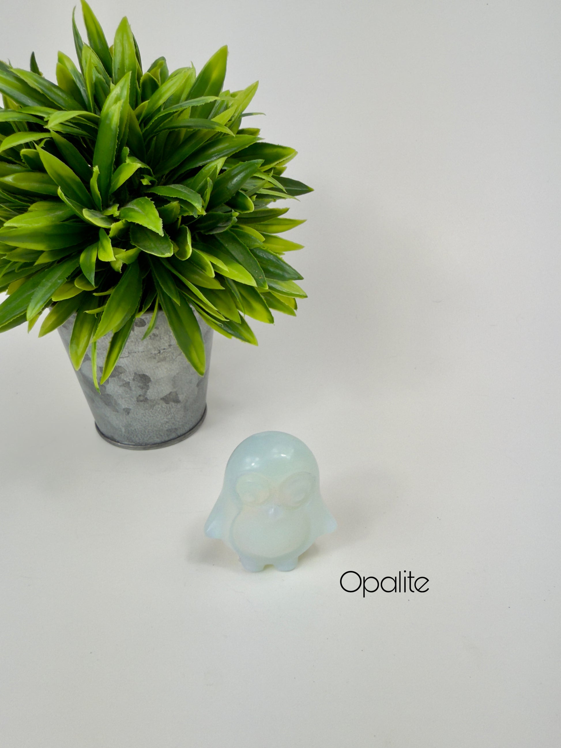 Opalite Penguin Carvings