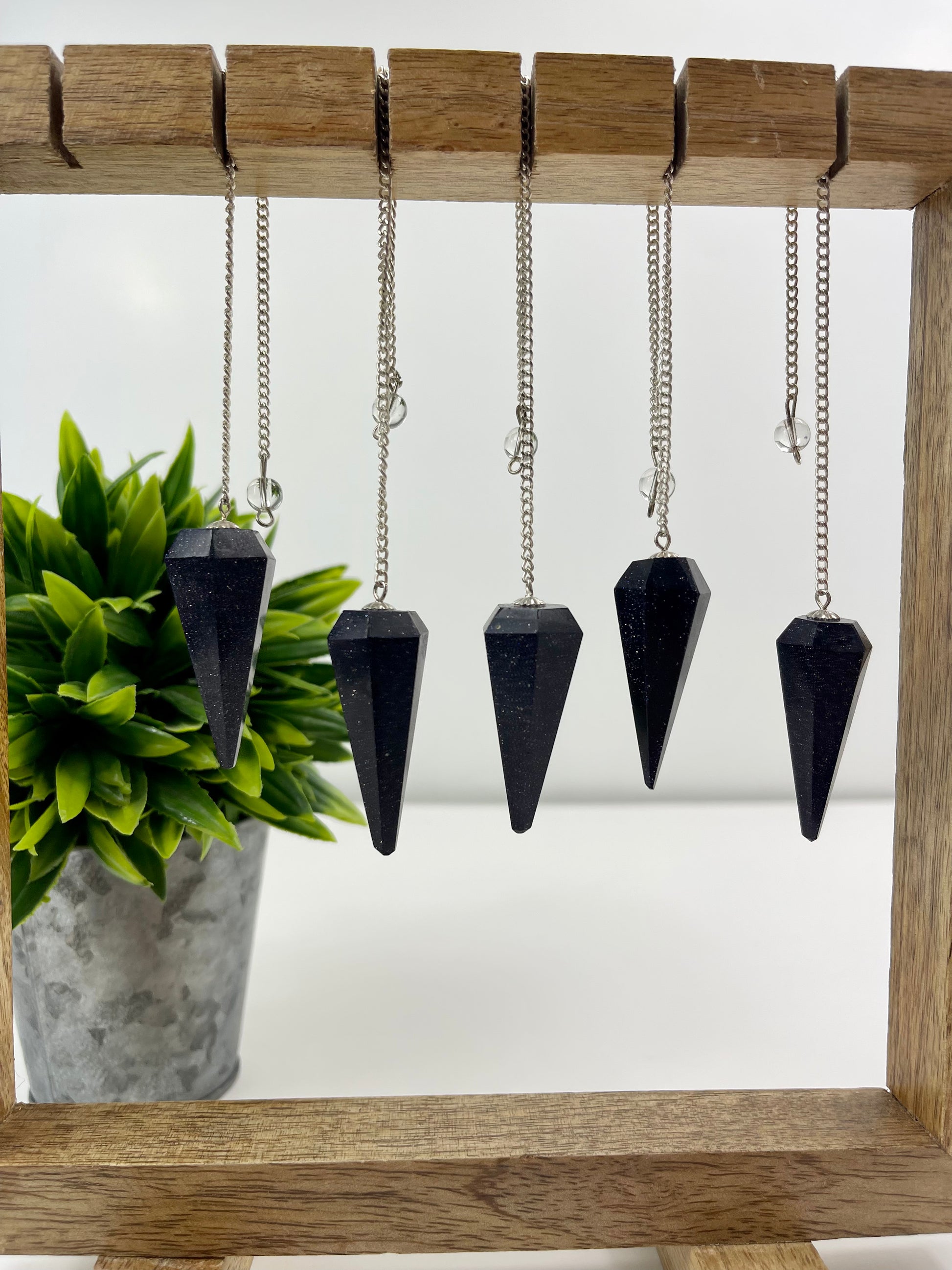 Blue Goldstone Pendulums